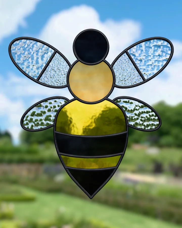 Bee suncatcher glazed, lit from behind.