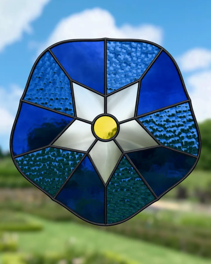 Morning glory suncatcher glazed, lit from behind.