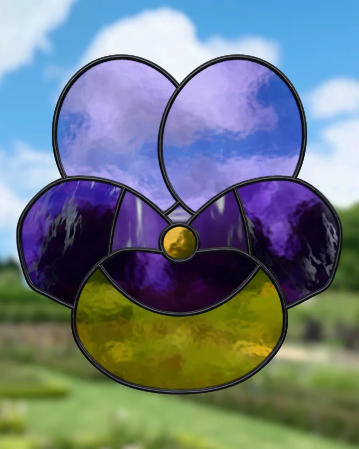 Pansy suncatcher glazed, lit from behind.