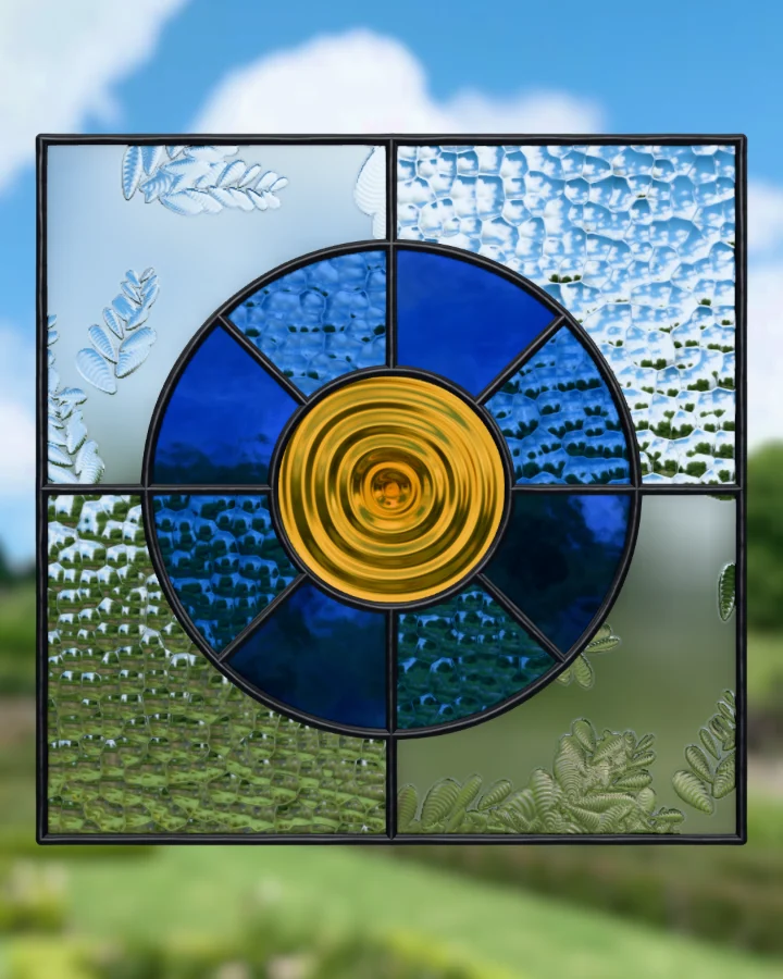 Roundel suncatcher glazed, lit from behind.