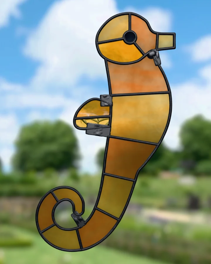 Seahorse suncatcher glazed, lit from behind.