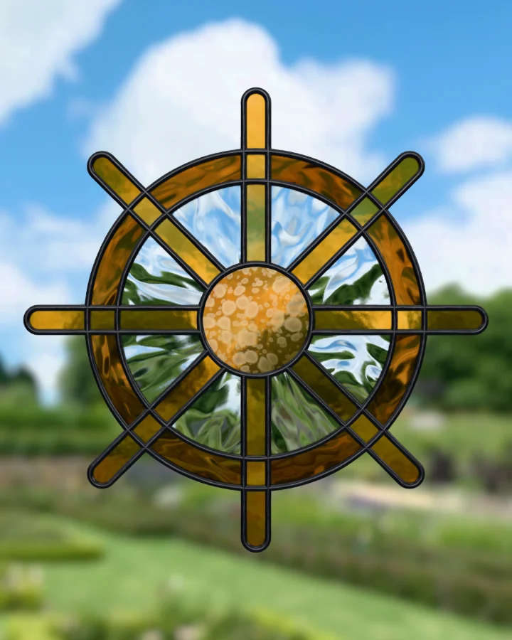 Ship's wheel suncatcher glazed, lit from behind.