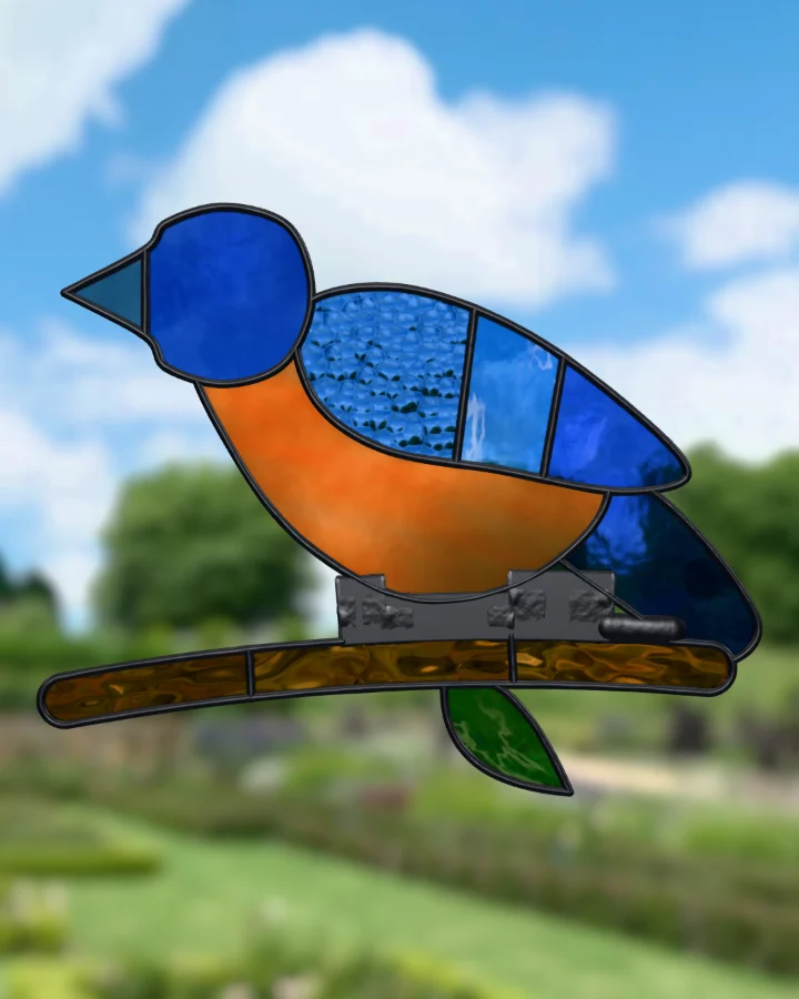 Songbird suncatcher glazed, lit from behind.