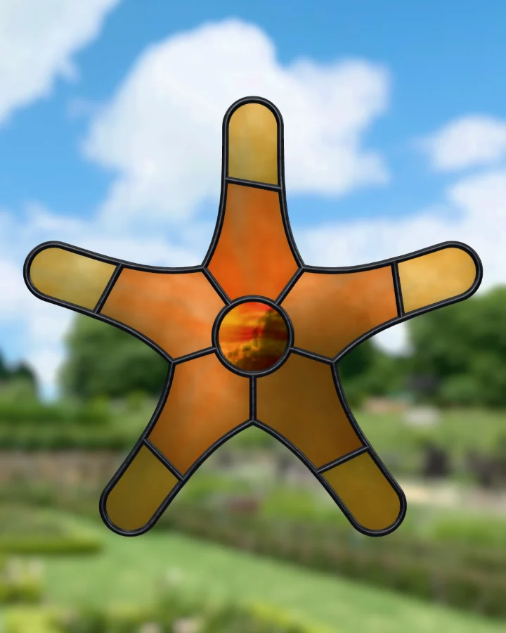 Starfish suncatcher glazed, lit from behind.