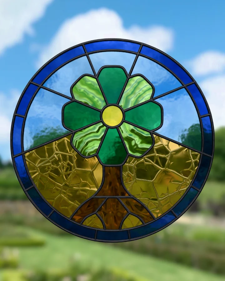 Tree of life suncatcher glazed, lit from behind.