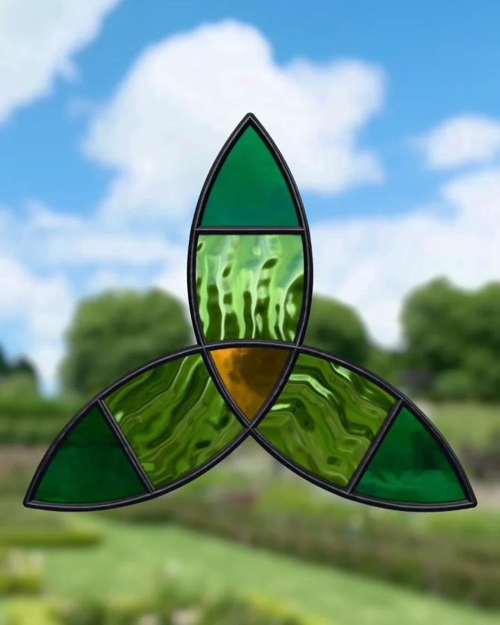 Triquetra suncatcher glazed, lit from behind.