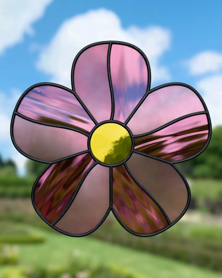 Wild rose suncatcher glazed, lit from behind.